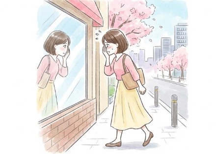 産後の抜け毛が気になり不安な表情の女性